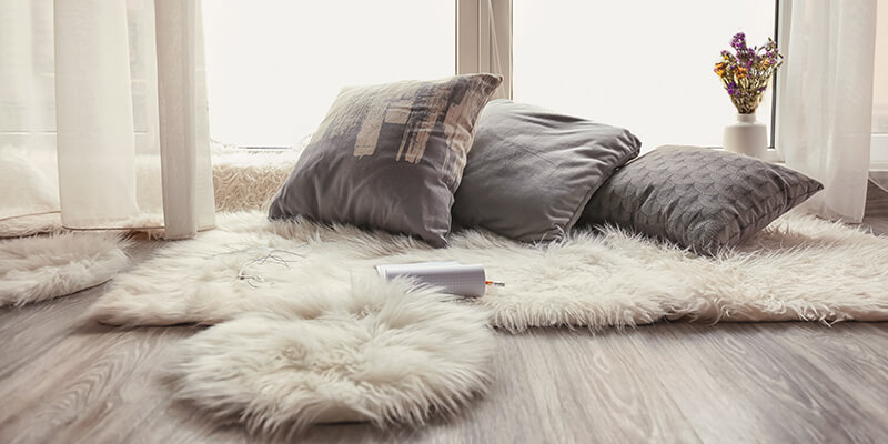 Fur rug with wooden floor