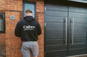 crown team by garage door
