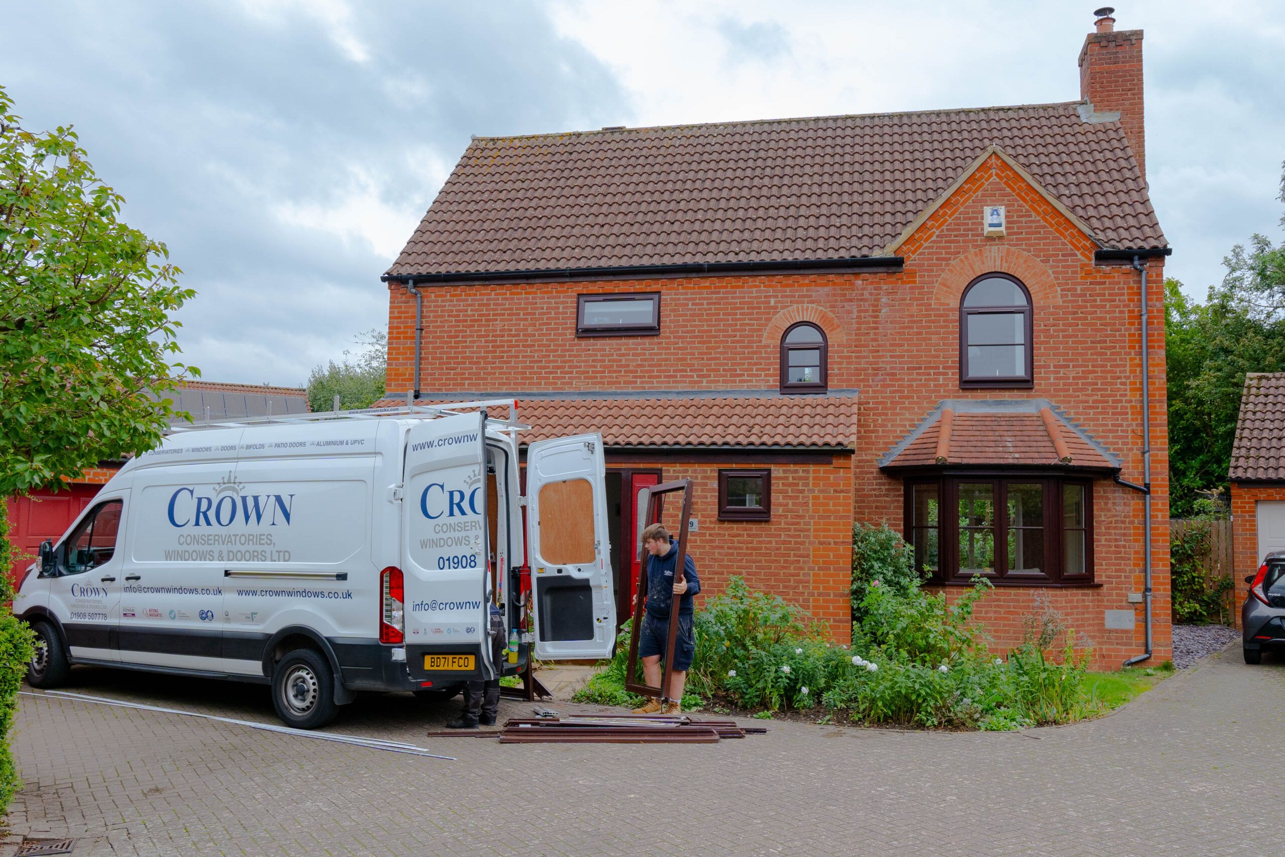 Crown Van Outside Property Scaled