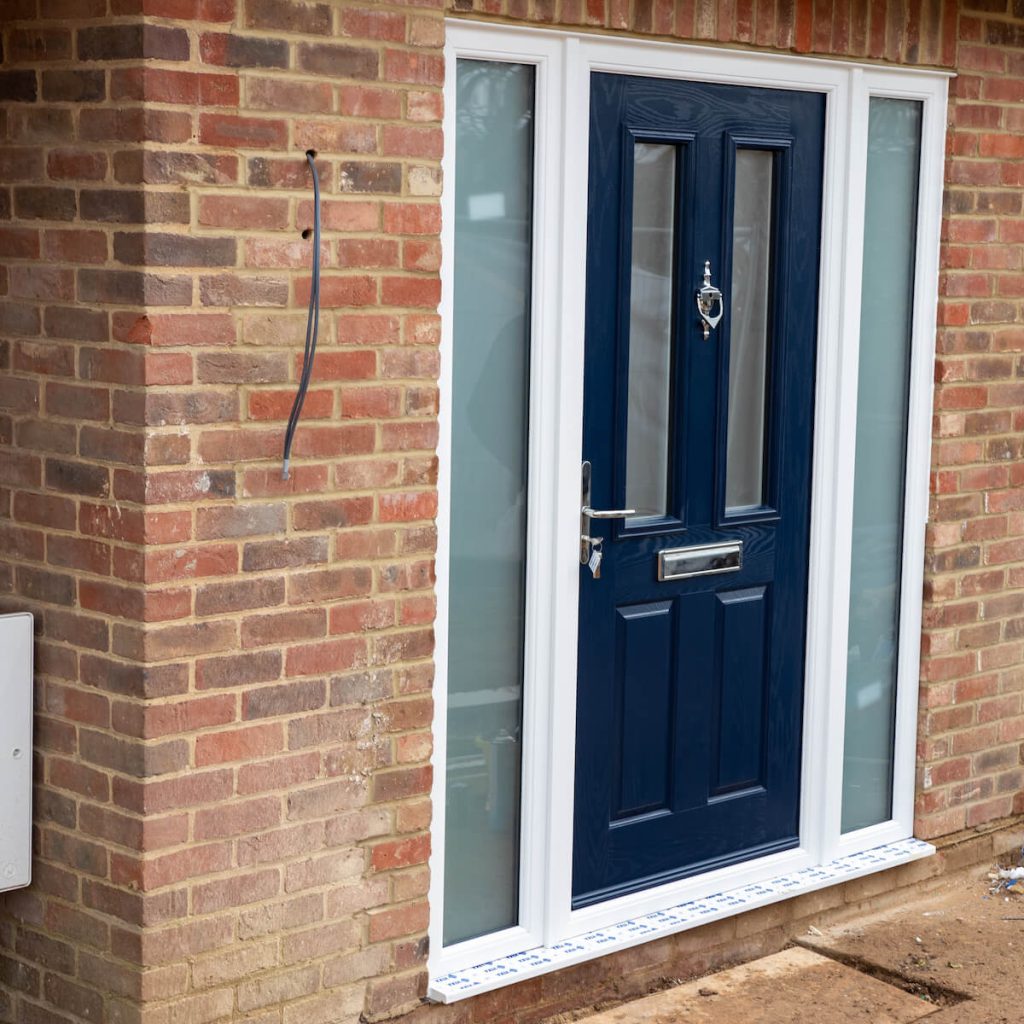 steel blue composite front door with sidelights