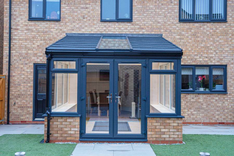 Lean to conservatory with tiled roof